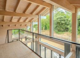 The large windows of the Polar House bring light to the upper floor