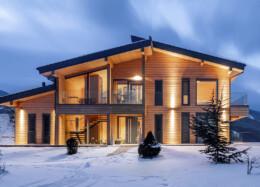 Winter view of a solid wood house