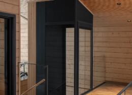 Lift shaft in a solid wood house